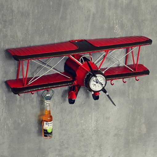 Horloge murale avion vintage en métal
